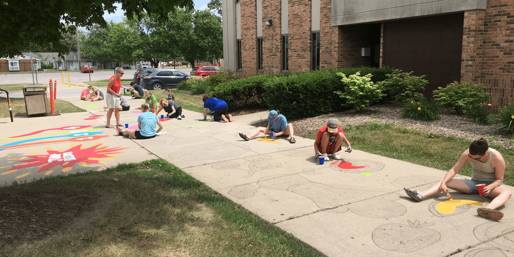 people working on the mural 2